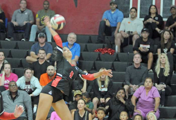 Lake Highland Prep sophomore Kiersten Bevelle goes for one of her match-high 14 kills against Boca Raton St. Andrew's in the Region 2-3A volleyball final. Bevelle also had 11 digs.